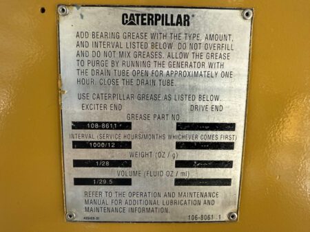 Caterpillar lubrication maintenance data plate on generator.