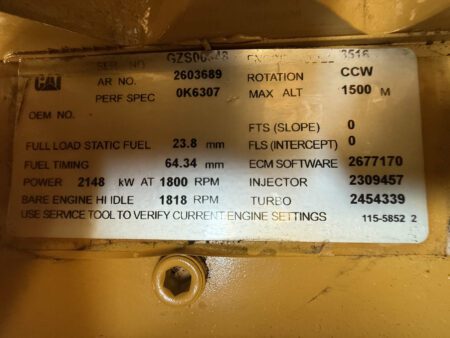Caterpillar generator end data plate with specifications.