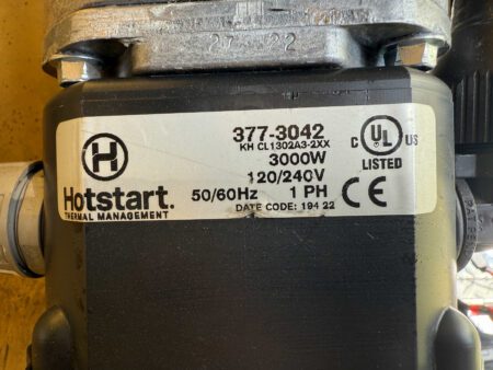 Hotstart coolant heater nameplate with specifications.