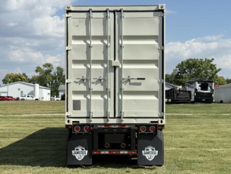 Rear-right view of Caterpillar generator container.