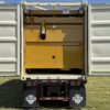 Right-side view of generator container with doors open.