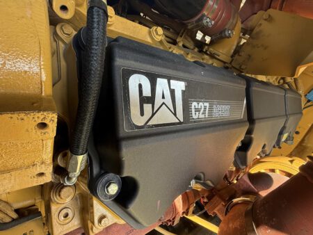 Caterpillar C27 ACERT valve cover on diesel generator engine.