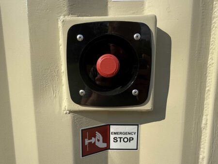 Exterior emergency stop button for generator.