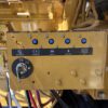 Engine-mounted control and start panel on Caterpillar C27 generator.