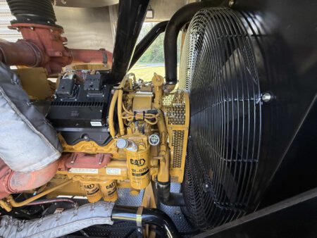 Right-side radiator end view with Caterpillar C27 engine and cooling system.