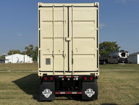 Right-side exterior view of Caterpillar containerized generator on trailer.