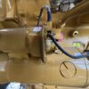 Caterpillar generator starter motor assembly and wiring connections.