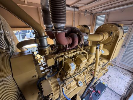 Caterpillar 3508B engine block, radiator, and dual air cleaners.