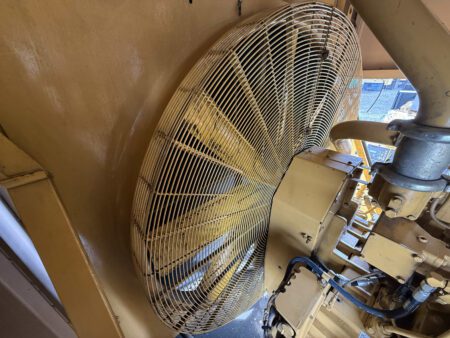 Caterpillar 3508B radiator fan and engine block.
