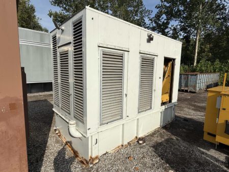 Caterpillar 3508B generator enclosure back-right corner view.