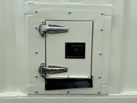 Closed generator shore power inlet box mounted on container.