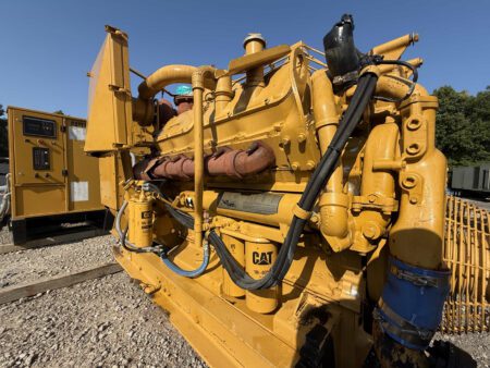 1988 Caterpillar 3412 600kW diesel generator engine close-up with fuel filter and piping
