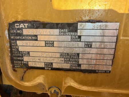 Caterpillar 3412 engine data plate showing Serial Number 81Z07443, Arrangement 2W7900, 890 HP, and 1800 RPM
