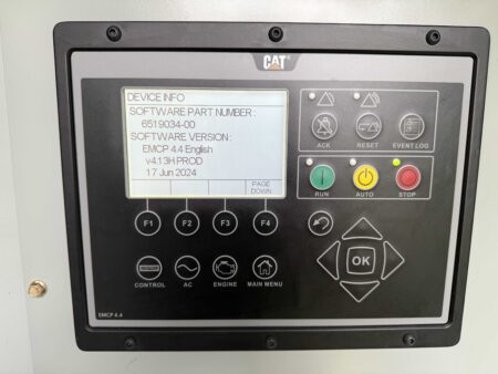 Caterpillar EMCP 4.4 digital generator control panel displaying software version and operational controls.