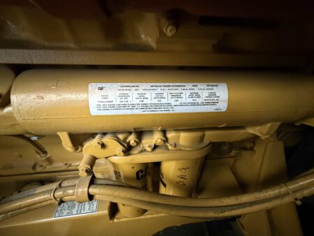 “Important Engine Information” emissions label on 2000 CAT 3412 generator—engine model 3412 tag mounted above the oil filters.