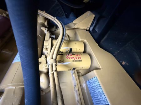 Dual engine oil filters on 2000 CAT 3412 500 kW generator (S/N BPG00168) with handwritten service/date note.