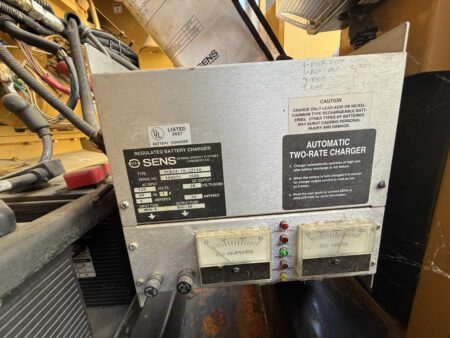 SENS regulated battery charger on 2000 CAT 3412 500 kW generator (S/N BPG00168) with analog amp/volt meters; 24 VDC, 10 A output.