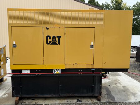 2003 Caterpillar 3306 250kW diesel generator – rear enclosure closed, mounted on sub-base fuel tank.