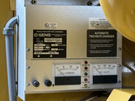 Close-up of SENS regulated battery charger on a 2003 Caterpillar 3306 250kW generator.