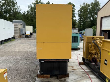 Left-side exterior view of 2003 Caterpillar 3306 250kW generator with sound-attenuated enclosure.
