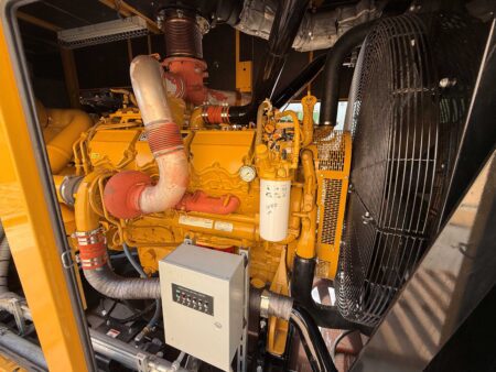 2010 CAT C27 800kW Diesel Generator – Right-Side Engine View with Load Bank Panel