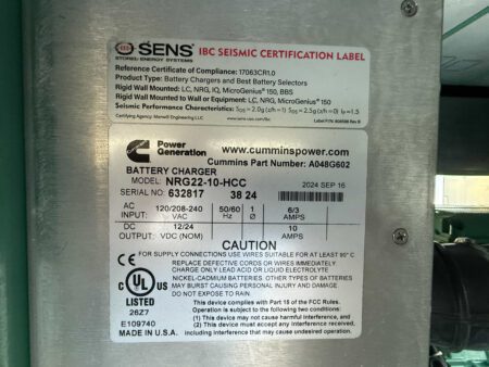 Label of a Cummins Power Generation battery charger, model NRG22-10-HCC, showing specifications and certification details.