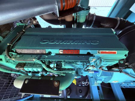 Top view of Cummins QSX15-G9 engine inside a 2018 DFEK 500kW diesel generator set.