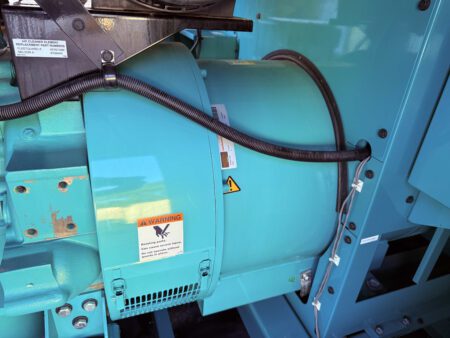 Side view of Stamford generator end mounted to Cummins QSX15 engine.