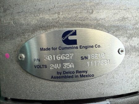 Delco Remy alternator tag showing specifications including part number, voltage, and amperage.