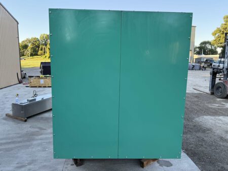 Right side of the Cummins DFEK generator enclosure with solid green panels.