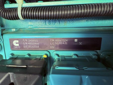 Data plate for 2018 Cummins DFEK 500kW diesel generator set with model and rating details.