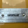 Caterpillar LC5 generator end data plate showing serial and arrangement numbers