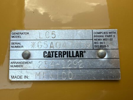 Caterpillar LC5 generator end data plate showing serial and arrangement numbers