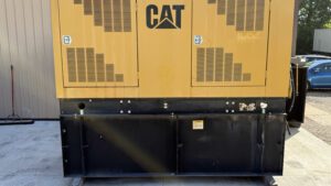 Rear view of 2001 Caterpillar 3306 250kW diesel generator with enclosure.