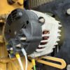Alternator assembly on CAT C4.4 diesel generator.