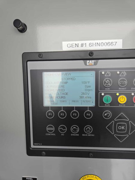 EMCP 4.3 control panel display showing 381.4 engine hours.