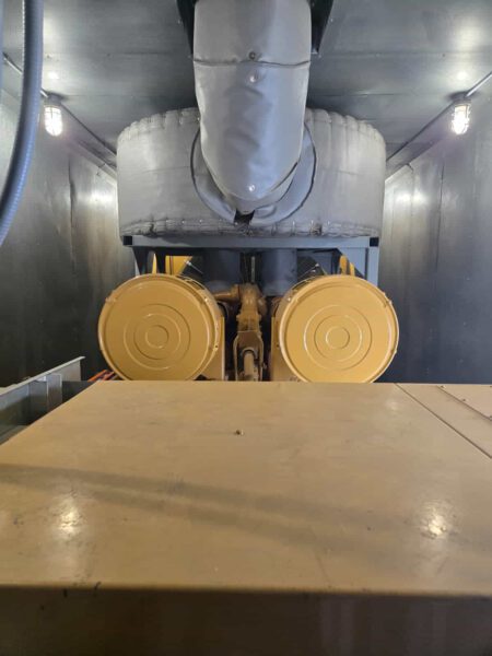Dual air cleaners and exhaust system of CAT 3516B generator.