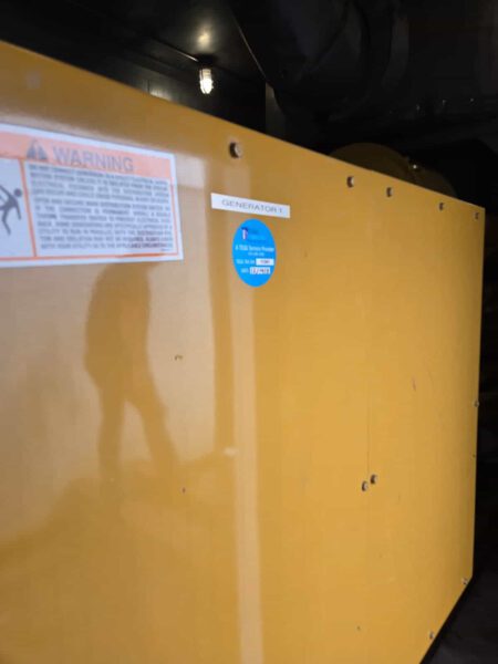 Exterior enclosure of CAT 3516B generator with “Generator 1” label.
