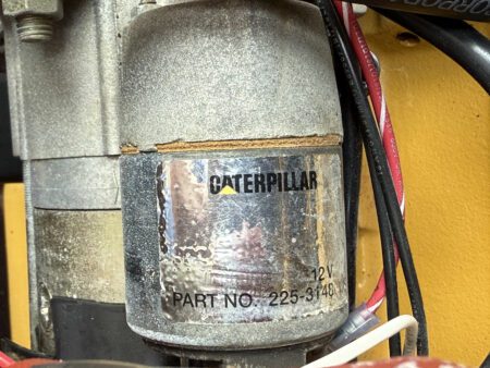 Caterpillar starter motor tag, part number 225-3148, 12V.