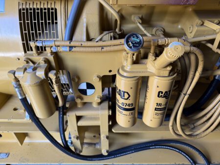 Dual Caterpillar 1R-0749 fuel filters with restriction gauge.