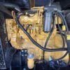 Engine side view of CAT C4.4 diesel generator with Perkins build.