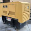 Rear-left view of Caterpillar C4.4 60 kW enclosed generator.
