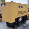 Caterpillar C4.4 60 kW diesel generator enclosure, rear-right view.