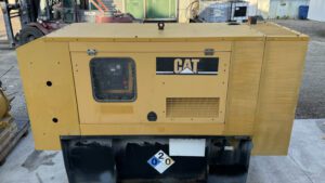 Front view of Caterpillar C4.4 generator enclosure with doors closed.
