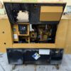 Caterpillar C4.4 generator front with enclosure doors open.