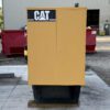 Right-side exterior view of Caterpillar C4.4 generator enclosure.