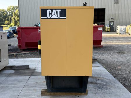 Right-side exterior view of Caterpillar C4.4 generator enclosure.