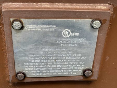 Metal nameplate showing 1,000-gallon UL-listed generator base tank.