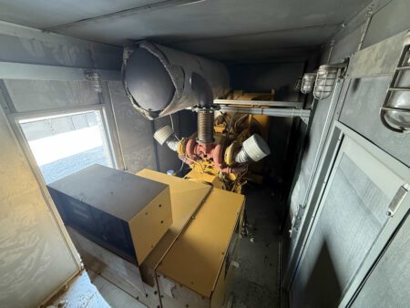 Interior view of generator enclosure with Caterpillar 3412 engine