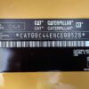 Caterpillar C4.4 generator identification tag with product ID.